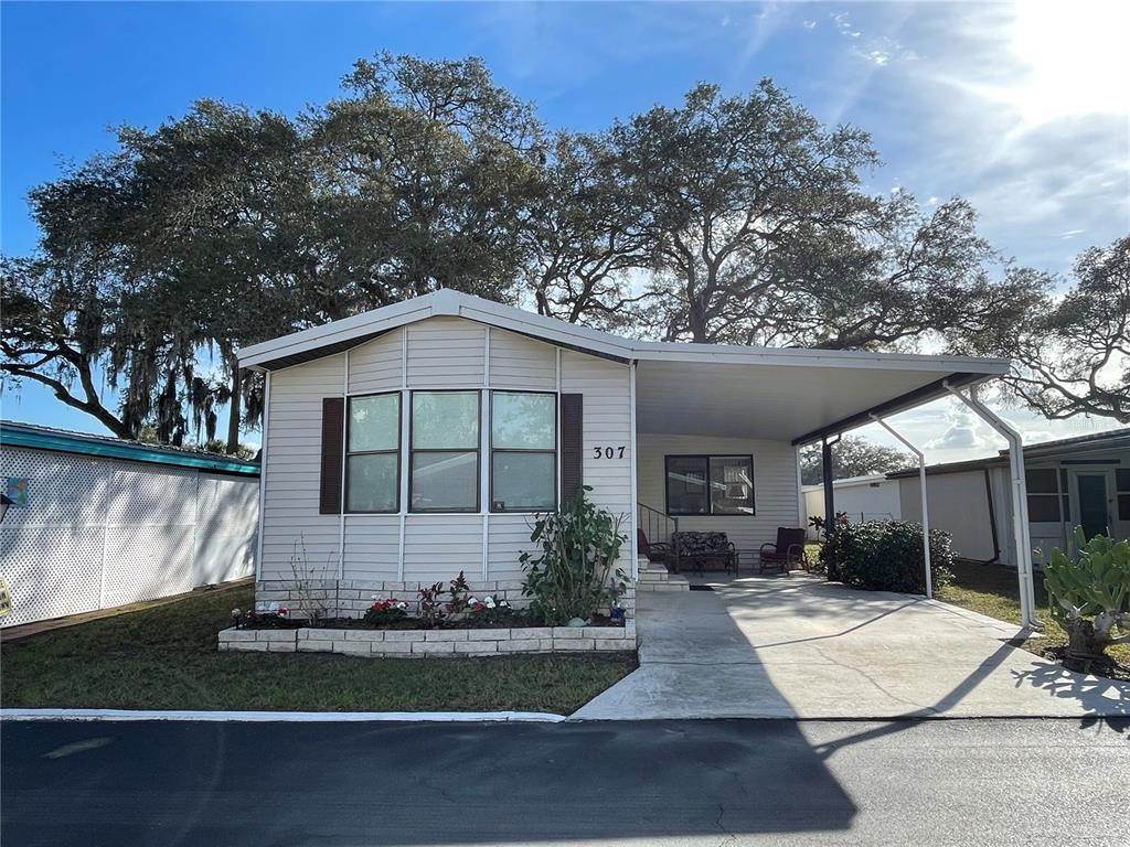 6. Single Family Homes for Sale at 20000 US HIGHWAY 19 307 Clearwater, Florida 33764 United States