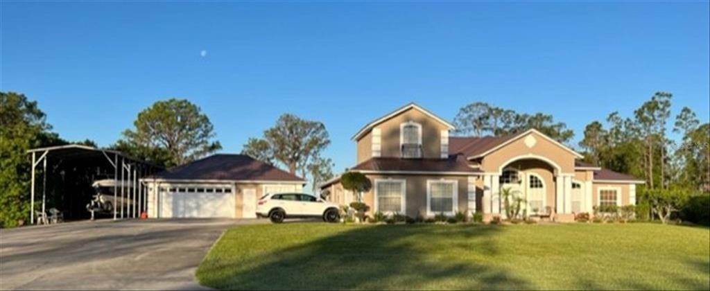 Single Family Homes por un Venta en 2360 LIVE OAK LAKE ROAD St. Cloud, Florida 34771 Estados Unidos