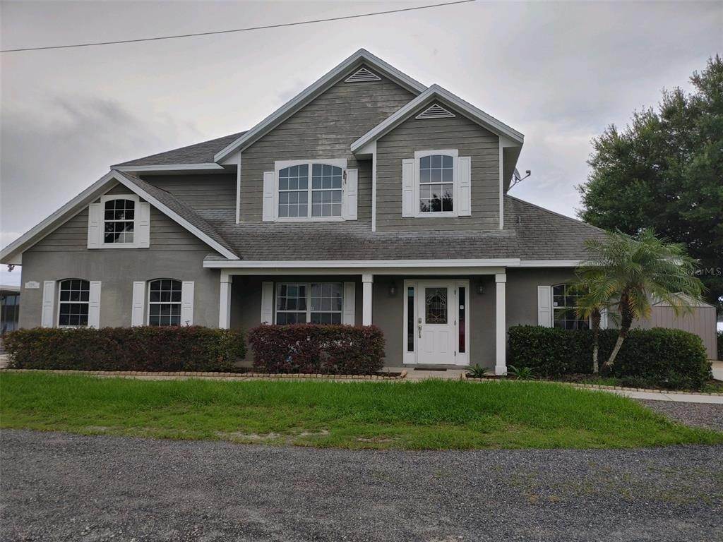 Single Family Homes por un Venta en 13641 NE 238TH COURT Fort Mc Coy, Florida 32134 Estados Unidos