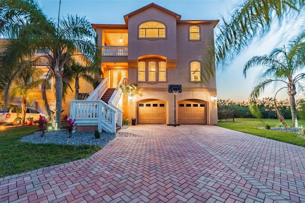 Single Family Homes por un Venta en 5640 EMERALD POINTE CIRCLE Port Richey, Florida 34668 Estados Unidos