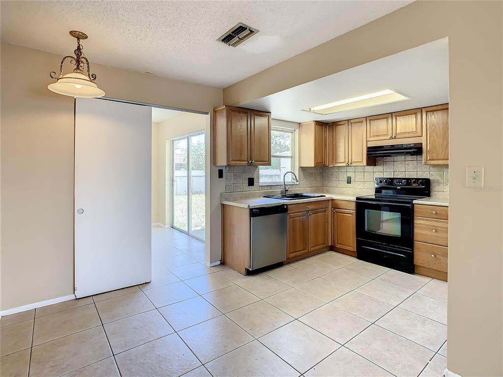 8. Single Family Homes for Sale at 9829 WOODSTOCK LANE Port Richey, Florida 34668 United States