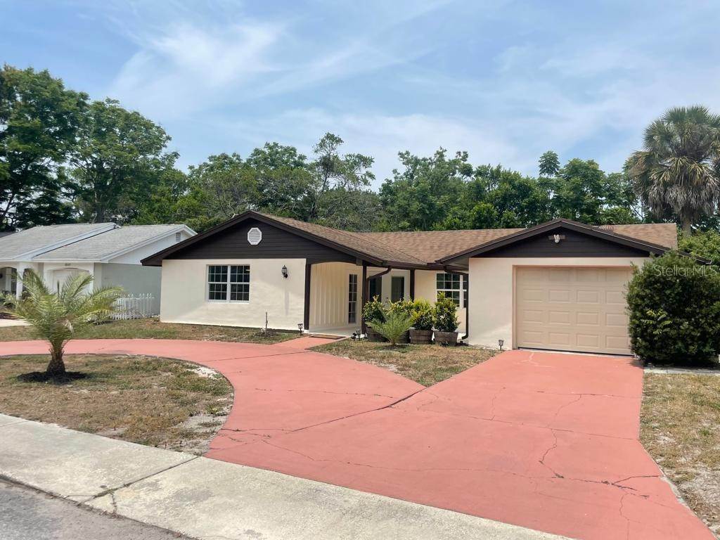 Single Family Homes por un Venta en 8509 HUNTING SADDLE DRIVE Bayonet Point, Florida 34667 Estados Unidos