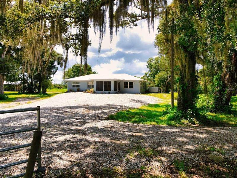 Single Family Homes por un Venta en 21405 DOOLEY GRADE ROAD Clewiston, Florida 33440 Estados Unidos