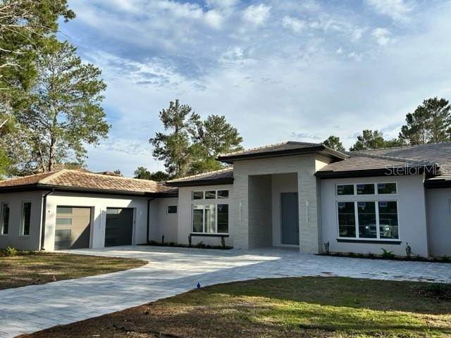Single Family Homes 为 销售 在 15124 PENDIO DRIVE 蒙特沃德, 佛罗里达州 34756 美国