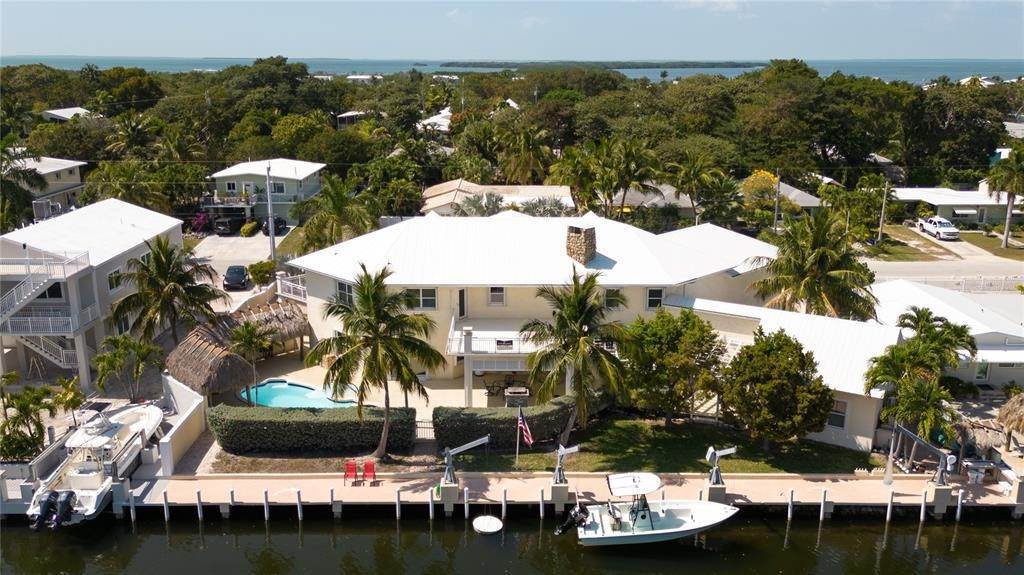 Single Family Homes 为 销售 在 246 S COCONUT PALM BOULEVARD 塔威尼尔, 佛罗里达州 33070 美国