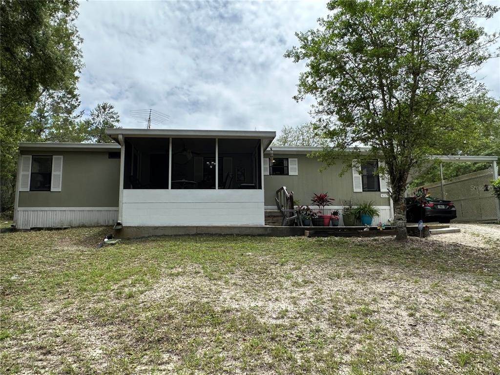 Single Family Homes por un Venta en 437 LAKE COMO DRIVE Pomona Park, Florida 32181 Estados Unidos